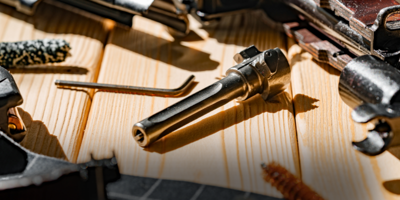 Gun Parts on wooden table